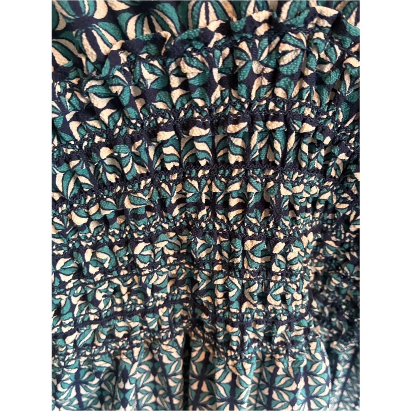 Blue Geometric Jumpsuit with Smocked Waist and pockets!