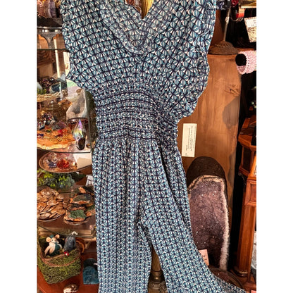Blue Geometric Jumpsuit with Smocked Waist and pockets!